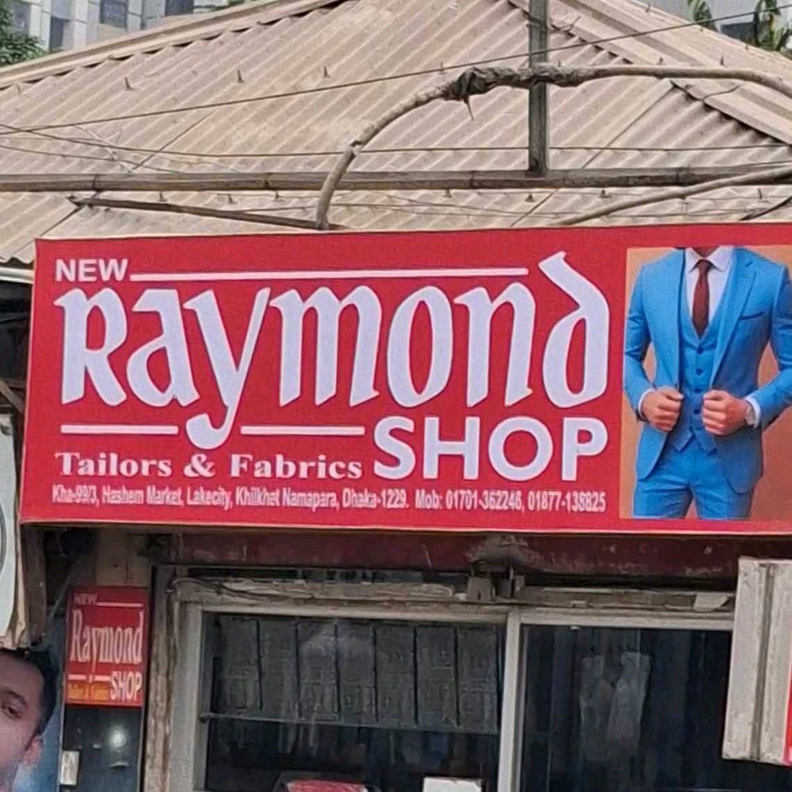New Raymond Tailors And Fabrics Shop